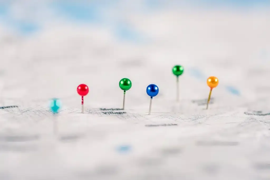 close-up shot of colorful local seo pins on map